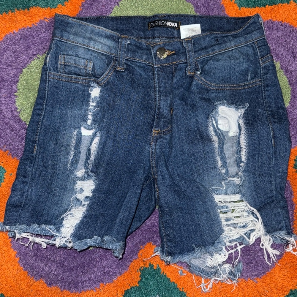 Distressed denim shorts